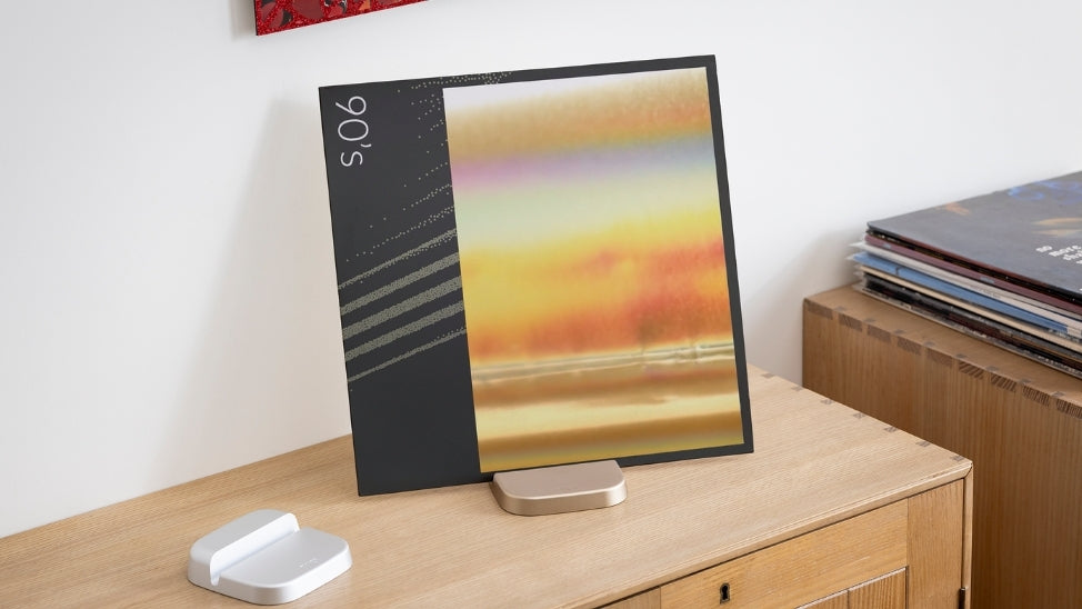 KEF vinyl holder on bookshelf.
